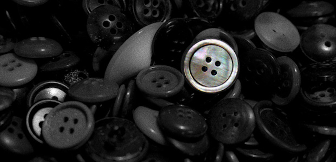 A bright button among a sea of dull buttons.